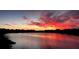 Beautiful sunset view over the water with vivid colors reflecting on the surface, creating a serene atmosphere at 1674 University Pkwy # 389, Sarasota, FL 34243