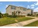 Charming two-story home with stone accents, well-maintained landscaping, and a welcoming entrance at 17209 Barnwood Pl, Bradenton, FL 34211