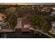 An aerial view highlighting a waterfront lot with a private dock, perfect for boating enthusiasts at 1806 Caribbean Dr, Sarasota, FL 34231
