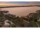 Aerial view featuring a waterfront lot ready for building, surrounded by desirable homes at 1806 Caribbean Dr, Sarasota, FL 34231