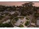 Aerial view of the home showcasing its layout, landscaped grounds, and proximity to the waterfront at 1806 Caribbean Dr, Sarasota, FL 34231