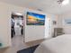 Bedroom with flat screen television and walk-in closet at 1806 Caribbean Dr, Sarasota, FL 34231