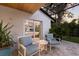 Covered patio area featuring comfortable seating and serene outdoor views at 1806 Caribbean Dr, Sarasota, FL 34231