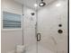Beautiful walk-in shower with elegant tile work, rainfall shower head at 1806 Caribbean Dr, Sarasota, FL 34231