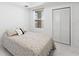 Cozy bedroom with a bright window and a closet at 200 Gardens Edge Dr # 222, Venice, FL 34285