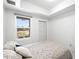 Bedroom with a window overlooking the neighborhood at 200 Gardens Edge Dr # 222, Venice, FL 34285