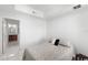 Bedroom featuring light walls and access to a bathroom at 200 Gardens Edge Dr # 222, Venice, FL 34285