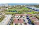 Aerial view of the community, showing proximity to parks and the cityscape in the distance at 2121 Wood St # 221, Sarasota, FL 34237