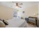 Bright bedroom with a ceiling fan, natural light, and light-colored walls at 2121 Wood St # 221, Sarasota, FL 34237