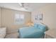 Another bedroom with coastal decor, natural light and neutral carpet at 2183 Nettlebush Ln, Venice, FL 34292