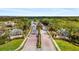 Community entrance with stone signage and lush landscaping; inviting entryway for a welcoming neighborhood at 2183 Nettlebush Ln, Venice, FL 34292