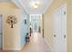 Spacious foyer with tiled flooring and views leading into the home's interior at 2183 Nettlebush Ln, Venice, FL 34292