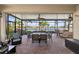 Relaxing screened-in patio with brick pavers and views of the lake at 2183 Nettlebush Ln, Venice, FL 34292