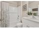 Well-maintained bathroom with a combined shower and bathtub, alongside a sink vanity with storage and decor at 2756 Canoe Ln, North Port, FL 34286