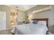 View of a bedroom with neutral walls and natural lighting leading into a hallway at 315 Londonderry Dr, Sarasota, FL 34240