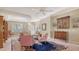 Open living room with elegant furniture, lots of natural light, and tile flooring at 315 Londonderry Dr, Sarasota, FL 34240