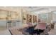 Open concept living room seamlessly connects to the kitchen, featuring stylish furnishings and lots of natural light at 315 Londonderry Dr, Sarasota, FL 34240