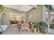 Inviting covered patio featuring comfortable seating, stylish decor, and seamless indoor-outdoor flow at 315 Londonderry Dr, Sarasota, FL 34240