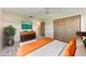 Staged bedroom with modern decor, a ceiling fan, and closet at 3259 Fairhaven Ln # 211, Sarasota, FL 34239