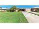 Charming home with a well-maintained lawn and an inviting driveway at 3259 Fairhaven Ln # 211, Sarasota, FL 34239