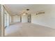 Large living room has sliding glass doors that open onto the lanai, and offers great lighting throughout at 3259 Fairhaven Ln # 211, Sarasota, FL 34239