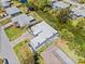 Aerial view of a modern home showcasing its unique architectural design and serene water views at 3319 Mayflower St, Sarasota, FL 34231