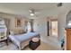 Relaxing bedroom with natural light and neutral tones, ceiling fan, and carpet floors at 3514 14Th E Ct, Ellenton, FL 34222