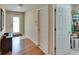 Bright hallway features fresh paint, convenient shelving and a closet for storage at 3514 14Th E Ct, Ellenton, FL 34222