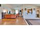Spacious living area with hardwood floors, open to kitchen and dining at 3514 14Th E Ct, Ellenton, FL 34222
