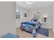 Charming bedroom featuring a playful theme and comfortable bedding at 3561 Elfers Pkwy, New Port Richey, FL 34655