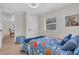 Adorable bedroom offering ample natural light and fun decor at 3561 Elfers Pkwy, New Port Richey, FL 34655