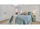 Inviting main bedroom with plush bedding, soft lighting, and elegant decor at 3561 Elfers Pkwy, New Port Richey, FL 34655