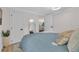 Spacious main bedroom offering ample natural light, comfortable bedding, and closet space at 3561 Elfers Pkwy, New Port Richey, FL 34655