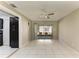 Bright dining area features tile flooring, ceiling fan, and sliding door access to the patio at 3717 Delta St # 95, Sarasota, FL 34232
