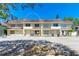 Inviting townhome with well-kept landscaping, neutral colors, and parking area at 3717 Delta St # 95, Sarasota, FL 34232