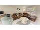 Cozy living room showcasing a comfortable couch, tile flooring and ample natural light at 3717 Delta St # 95, Sarasota, FL 34232