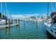 Serene view of the Sarasota marina, filled with sailboats and yachts, under a clear blue sky at 3717 Delta St # 95, Sarasota, FL 34232