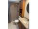 Bathroom featuring a shower, sink, and cabinet at 3799 Countryside Rd, Sarasota, FL 34233