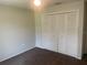 Bedroom featuring carpeted floors, a closet, and neutral walls, offering a cozy and versatile space at 3799 Countryside Rd, Sarasota, FL 34233