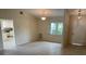 Dining area featuring tile floors, large window, and contemporary lighting fixtures at 3799 Countryside Rd, Sarasota, FL 34233