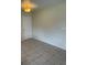 Neutral living room with tile flooring, ample natural light and access to other living areas at 3799 Countryside Rd, Sarasota, FL 34233