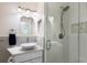 Elegant bathroom featuring a sleek vanity, vessel sink, and modern glass shower at 426 S Shore Dr, Sarasota, FL 34234