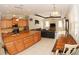 Open living space with modern kitchen, tile flooring, and view of the backyard at 4506 62Nd E Ter, Bradenton, FL 34203