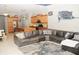 Open layout with gourmet kitchen, tile flooring, and comfortable seating area at 4506 62Nd E Ter, Bradenton, FL 34203