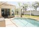 Screened pool with covered lanai, patio, and lounge seating at 4506 62Nd E Ter, Bradenton, FL 34203