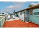 Relaxing backyard featuring lounge chairs and outdoor dining space; camper trailer in the background at 4524 106Th W St, Bradenton, FL 34210