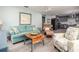 Inviting living room with comfortable seating and access to the well-equipped kitchen and dining area at 4524 106Th W St, Bradenton, FL 34210