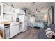 Open floor plan with kitchenette, sleeper sofa, and queen bed, creating an inviting and functional living area at 4524 106Th W St, Bradenton, FL 34210