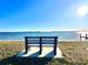 Scenic water view from a park bench, offering a tranquil space to enjoy the waterfront landscape at 4524 106Th W St, Bradenton, FL 34210