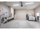 The spacious garage has a washer and dryer, a door and some stairs at 4659 Alligator Dr, Venice, FL 34293